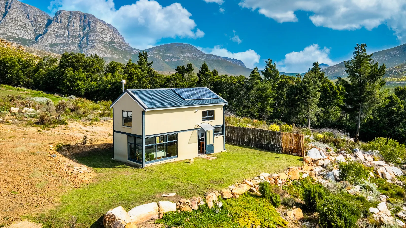 Shepherd's Rest tiny house beneath the surrounding mountain peaks